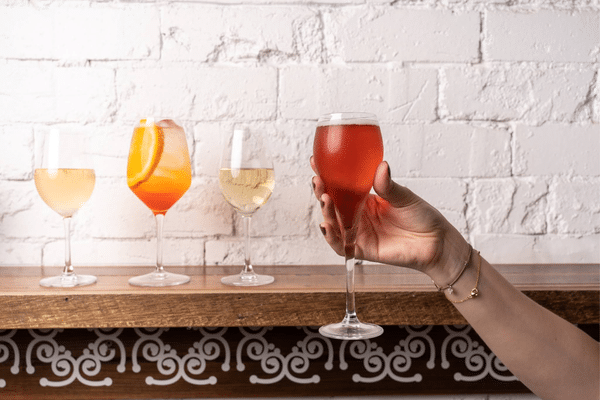 Various drinks on offer, including white white, prosecco, kir and aperol spritz